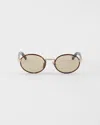 Prada Sunglasses With The Iconic Metal Plaque In Gold