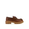 Prada St. Moritz Derby Loafers In Brown