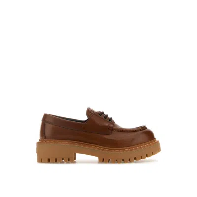 Prada St. Moritz Derby Loafers In Brown
