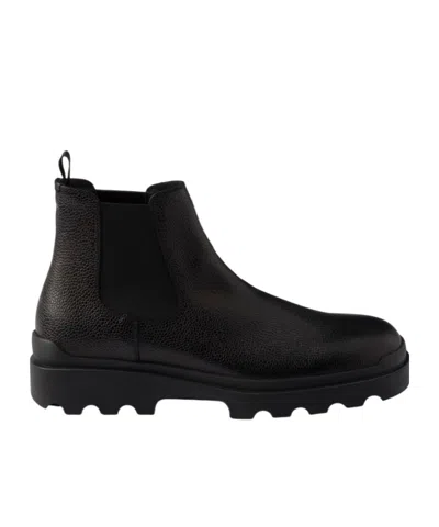 Prada Stamped Leather Chelsea Boots In Black