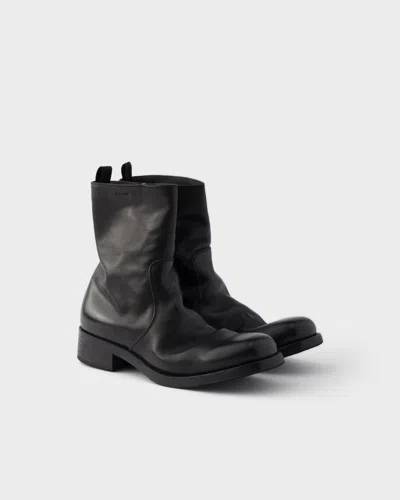 PRADA LEATHER ZIPPER BOOTS
