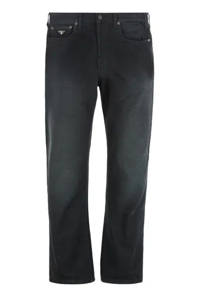 Prada Straight-leg Jeans With Engraved Logo Metal Hardware In Black