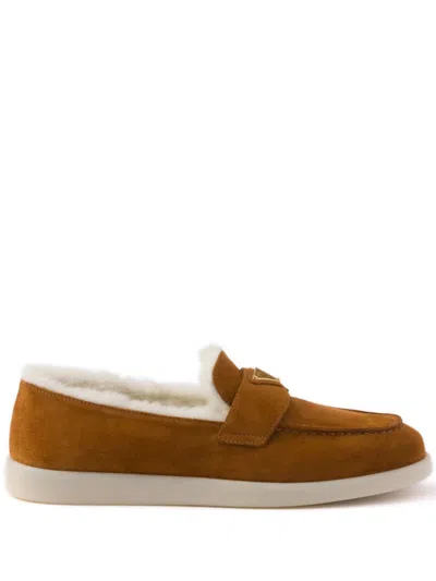 PRADA SUEDE AND SHEARLING LOAFERS