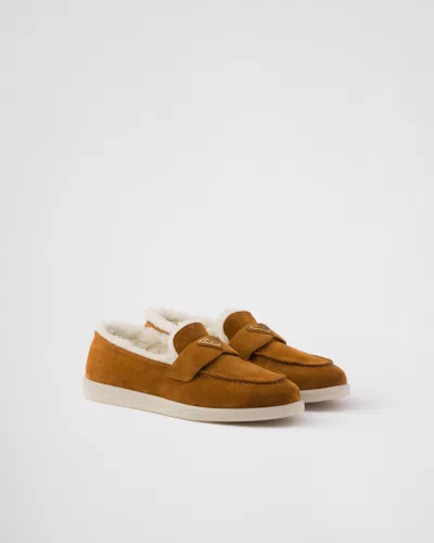 Prada St Tropez Suede Shearling Loafers In Cognac