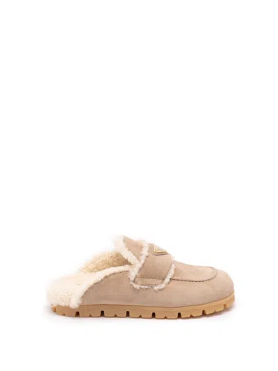 Prada Suede And Shearling Mules In Brown