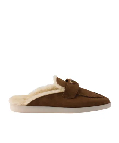 Prada Suede And Shearling Mules In Brown