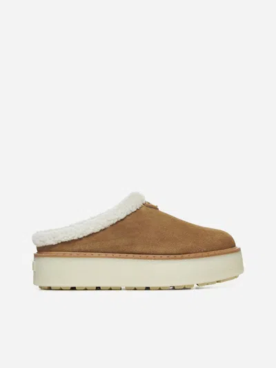 Prada Brown Suede Mules With Shearling Trim And Plush Lining In Blue