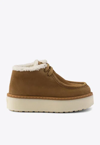 PRADA SUEDE LACE-UP FLATFORM BOOTS