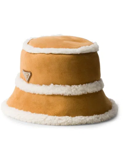Prada Suede Shearling Bucket Hat In Honig