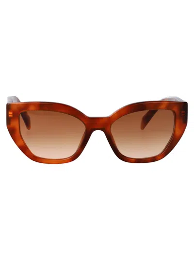Prada Sunglasses In Brown