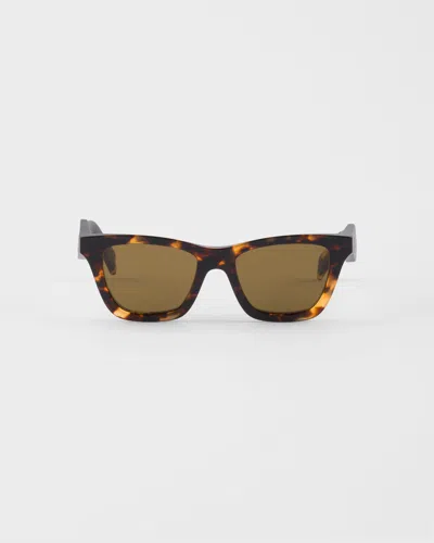 PRADA SUNGLASSES WITH PRADA LOGO