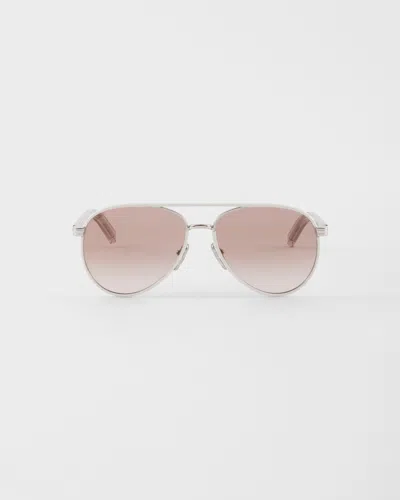 Prada Sunglasses With The Iconic Metal Plaque