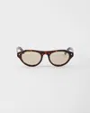 Prada Sunglasses With The Iconic Metal Plaque