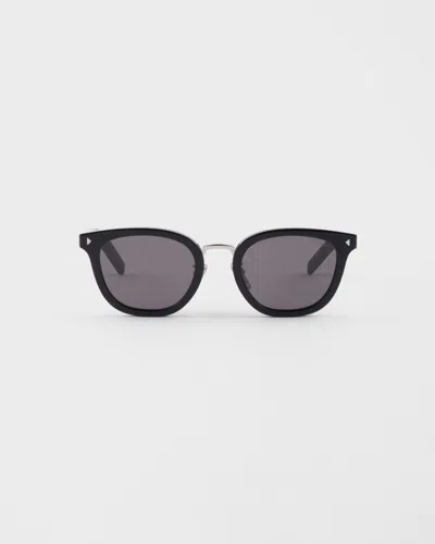 Prada Sunglasses With The Iconic Metal Plaque In Black