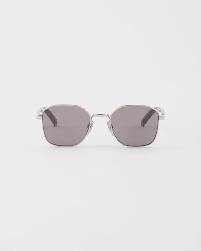 Prada Sunglasses With The Iconic Metal Plaque In Gray