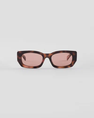 PRADA SUNGLASSES WITH THE PRADA LOGO