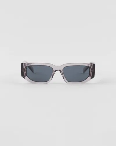 PRADA SUNGLASSES WITH TRIANGLE LOGO