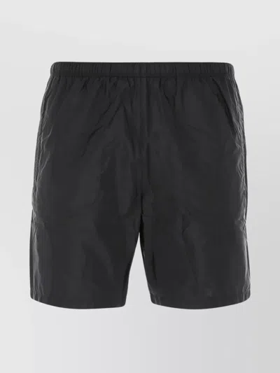 PRADA SWIMWEAR WITH BACK POCKET AND ELASTIC WAISTBAND