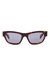 Prada Symbole Sunglasses In Brown