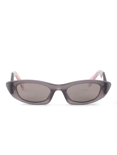 Prada Symbole Sunglasses In Gray