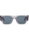 Prada Symbole Sunglasses In Grey