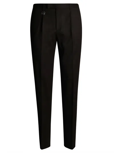 PRADA PRADA TAILORED EBONY TROUSERS WITH SUBTLE PLEATS