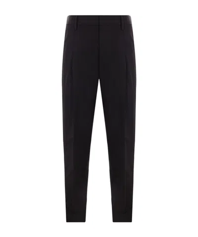 Prada Tailored Pleated Cotton Trousers In Black