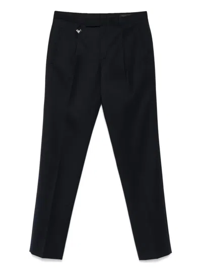 PRADA PRADA TAPERED LEG WOOL TROUSERS CLOTHING
