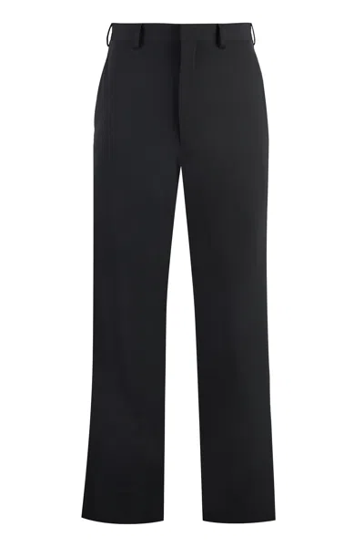Prada Technical Fabric Pants With Leather Detailing And Extendable Side Zippers In Black
