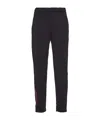 Prada Technical Knit Trousers In Black