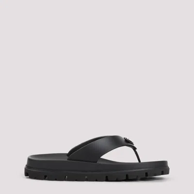 Prada Triangle Logo Rubber Thong Sandals In Black