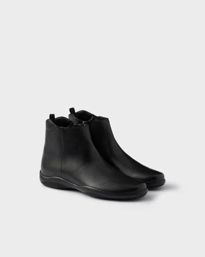 PRADA TOBLACH STIEFELETTEN AUS LEDER