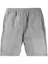 Prada Triangle Detail Elasticated Shorts In Grey