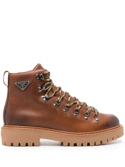Prada Triangle-enamel Boots In Brown
