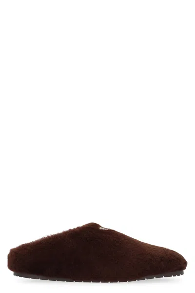 Prada Triangle Enamel Sheepskin Sabot In Brown