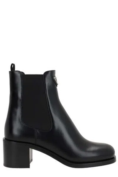 PRADA TRIANGLE-LOGO ANKLE BOOTS