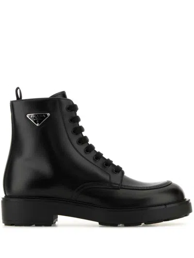 Prada Logo-plaque Panelled Ankle Boots In Black