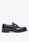 Prada Triangle Logo Brushed Leather Loafers In Black