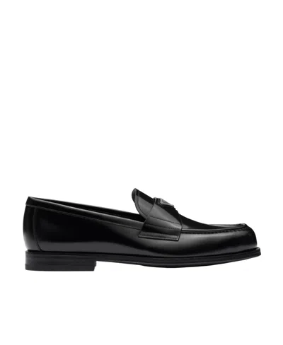 PRADA PRADA LOGO PLAQUE ALMOND-TOE LOAFERS