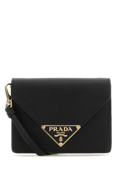 Prada Triangle Logo Fold Over Wallet In Black