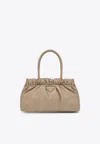 Prada Triangle Logo Leather Drawstring Handbag In Sand