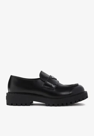Prada Triangle Logo Leather Loafers In Black