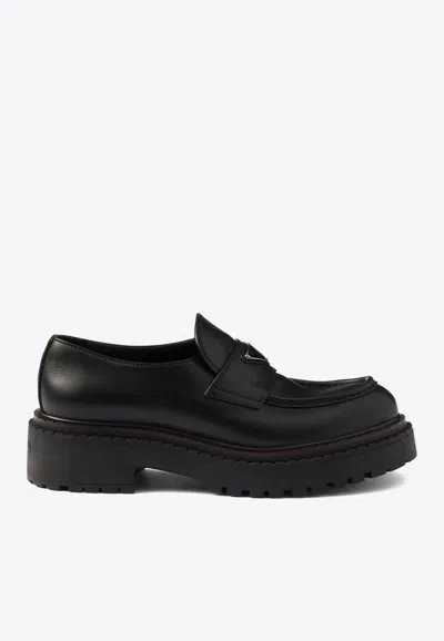 Prada Triangle Logo Leather Loafers In Black