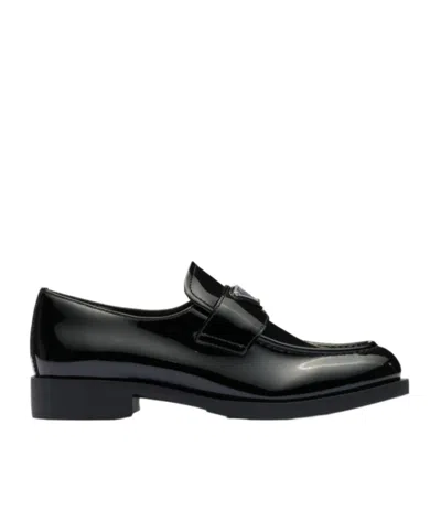 Prada Brand-plaque Patent Leather Loafers In Black
