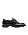 Prada Logo Plaque Almond-toe Loafers In Black