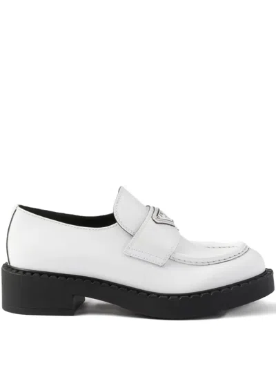 PRADA TRIANGLE-LOGO LEATHER LOAFERS
