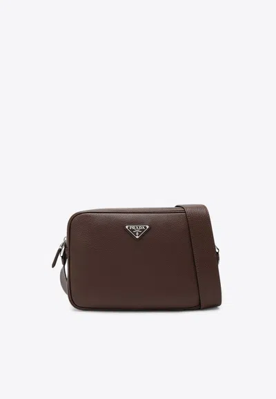 Prada Triangle Logo Leather Messenger Bag In Brown