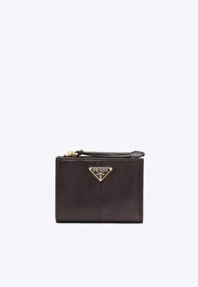 Prada Triangle Logo Leather Zip Wallet In Brown