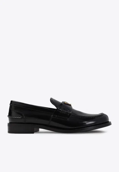 Prada Leather Loafers With Decorative Buckle And Round Toe In Black