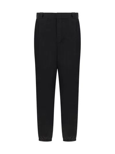 Prada Triangle-logo Mid-rise Tapered-leg Trousers In Default Title